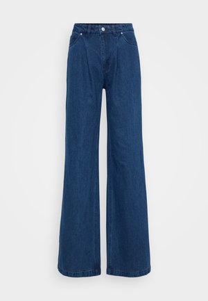Bredde ben blå denimbukser med høy midje, med frontlommer og knappelukking. Glatt tekstur uten synlige mønstre.