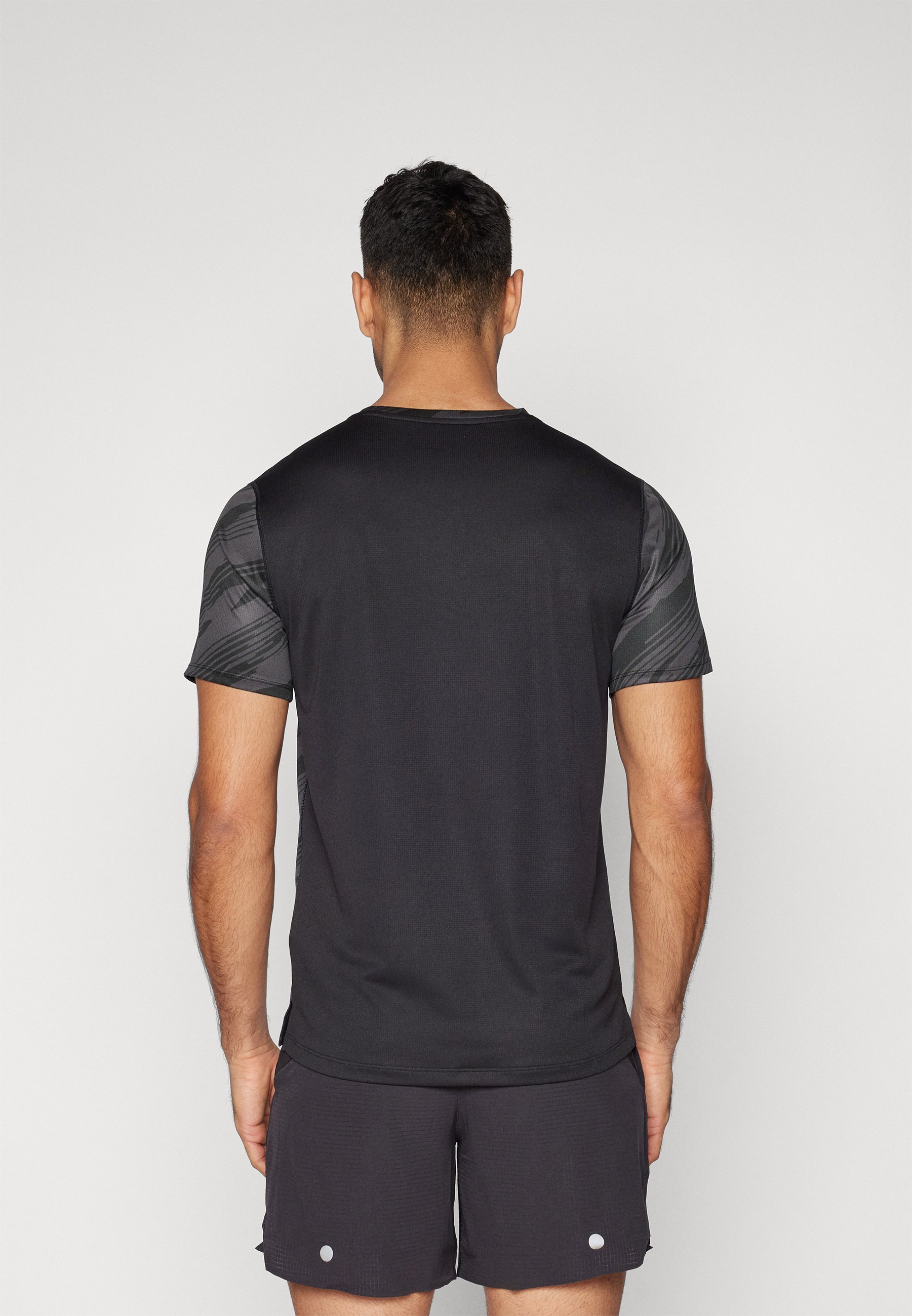 ASICS CORE ALL OVER PRINT TOP - Sports T-shirt - performance