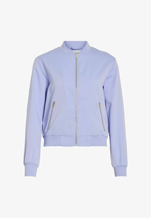 Világoslila bomber dzseki elöl aranyszínű cipzárral és két cipzáras oldalzsebbel, bordázott gallérral, mandzsettával és szegéllyel.