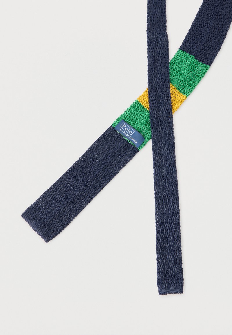 Knitted navy blue tie with green and yellow stripes near the top and a small Polo by Ralph Lauren label.