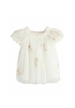 Hvid tyl-top med korte pufærmer, prydet med blomsterbroderi i subtile beige nuancer. Elastisk halsudskæring, let og luftig pasform.