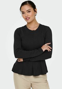Black long-sleeve top with a peplum hem, made of soft fabric. Features a round neckline and vertical seam detailing for added shape.