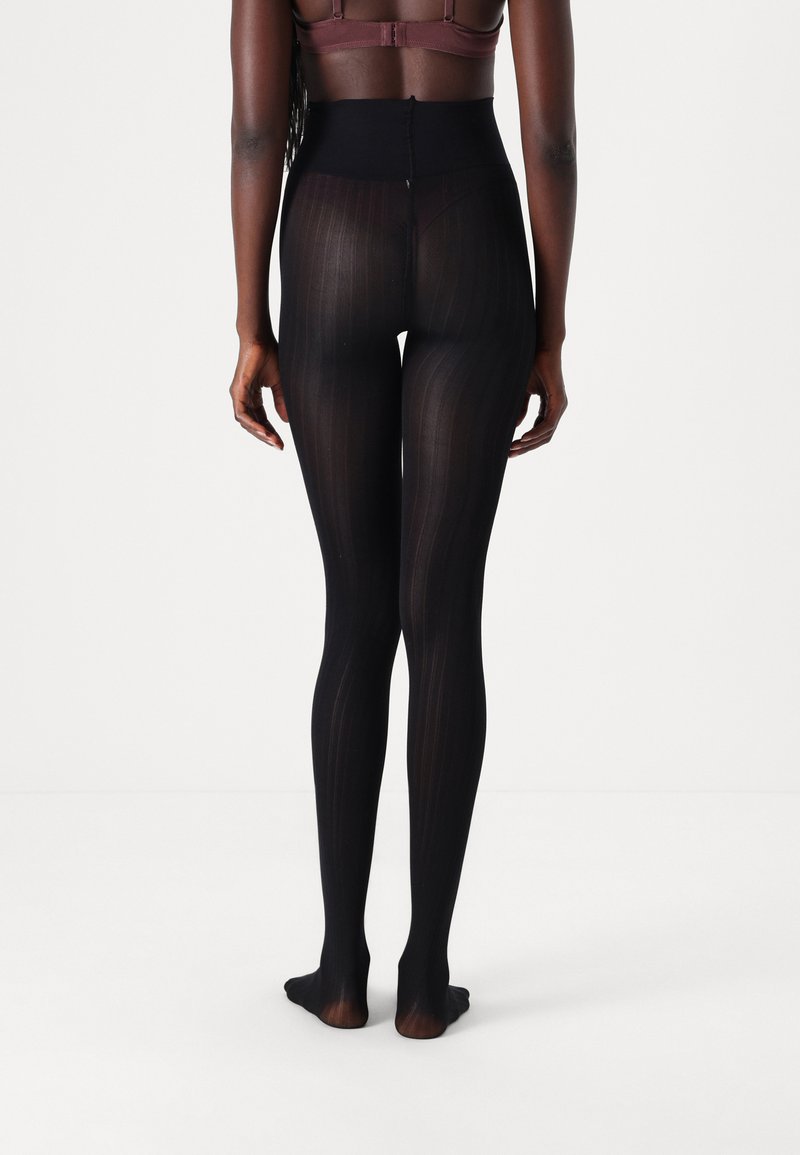 Swedish Stockings Zoe Ribbed Tights in Black main image 1
