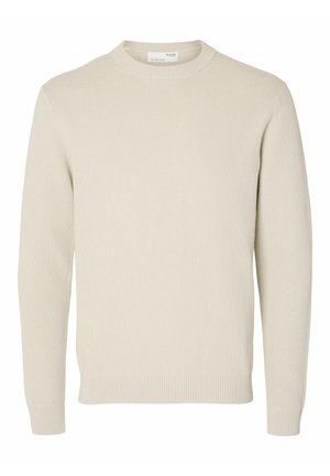Stickad tröja - beige