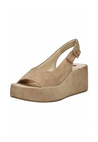 Sandale compensée ouverte en daim beige avec bride à la cheville et boucle, dotée d'une semelle plateforme épaisse et d'une doublure intérieure douce.