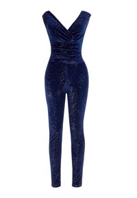 Giubbotto in velluto blu scuro con scollatura a V senza maniche, vita aderente e gambe slim affusolate, caratterizzato da un leggero effetto scintillante.