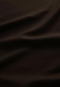 Dark brown, smooth fabric with a subtle sheen, featuring gentle waves and folds, highlighting its texture and depth.