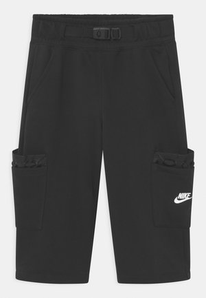 Short cargo noir Nike avec ceinture réglable, poches latérales et logo Nike blanc sur la poche droite.