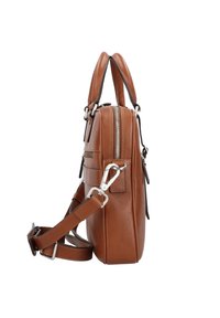 Brown leather bag with a smooth texture, rectangular shape, dual handles, and a detachable strap. Features silver hardware and side pockets.