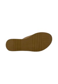 Suola di scarpa in gomma marrone con superficie testurizzata, caratterizzata da scanalature orizzontali e una leggera curvatura. Incisione visibile nella zona del tallone.