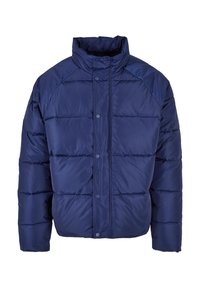 Navy blue puffer jacket with a high collar, snap buttons, and horizontal quilted sections. Made from a shiny, lightweight material.