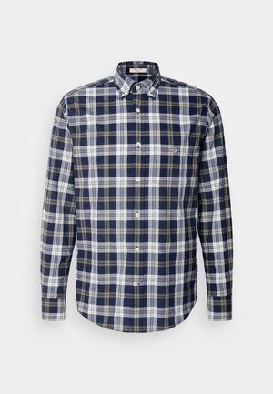 Navy and white plaid shirt with green accents, button-down collar, long sleeves, and a rounded hem. Made from woven fabric.