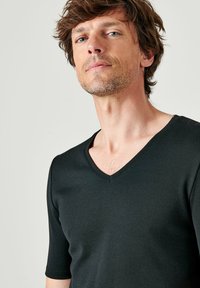 Damart COL V MANCHES COURTES THERMOLACTYL - Maglietta intima - noir