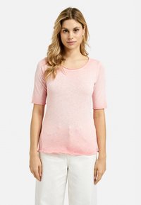 Rosa kurzärmliges T-Shirt mit rundem Halsausschnitt, aus leichtem, leicht strukturiertem Stoff mit abgerundetem Saum.