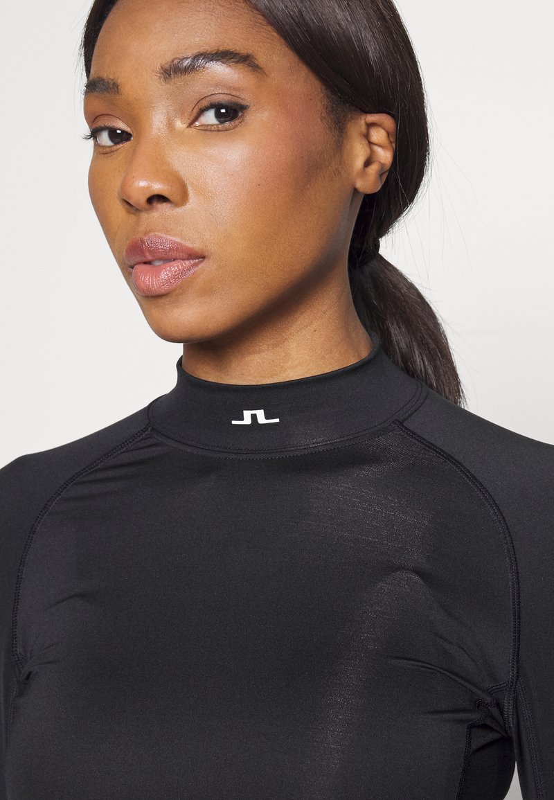 J.Lindeberg ASA Maillot de corps de golf à compression souple 2022 pour femme, noir, Taille L