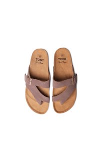 Brown suede sandals with a cross strap design, featuring a metal buckle. The insole is tan with the brand name printed. Size 42 indicated.