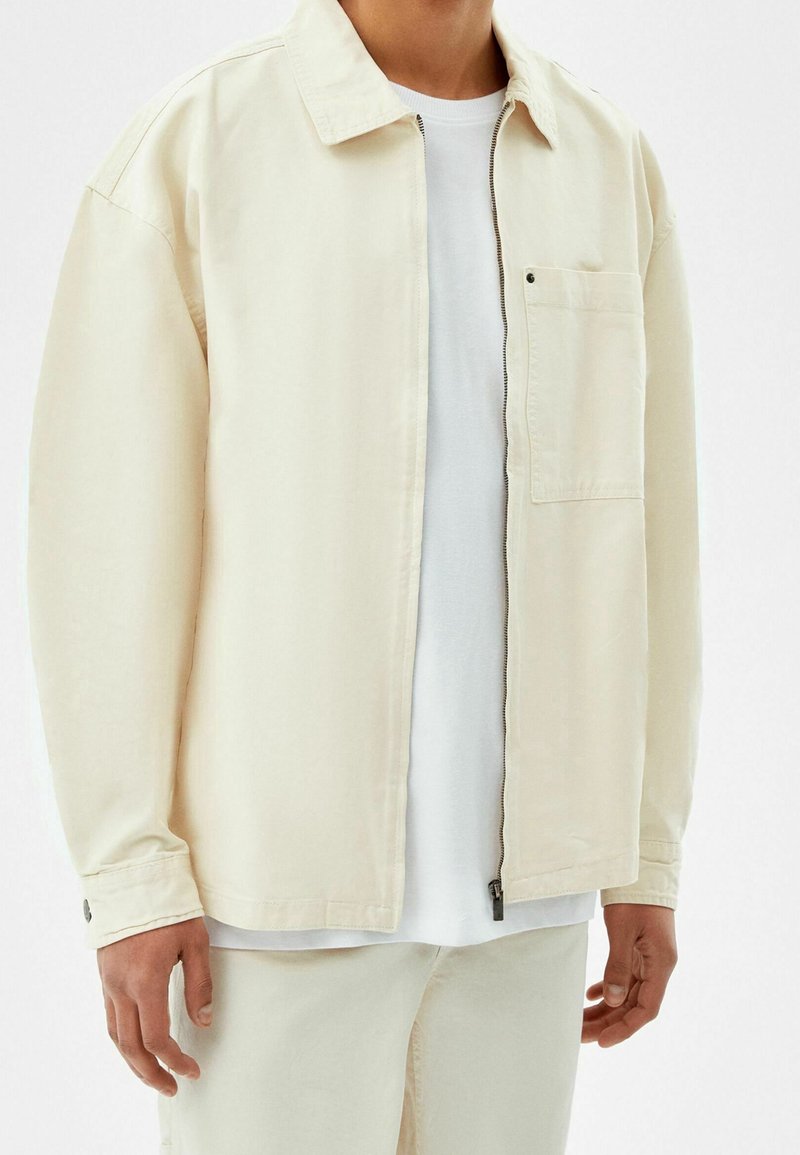 Bershka Tunn jacka - sand