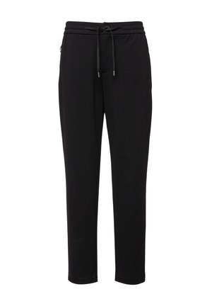Czarne spodnie dresowe z elastycznym pasem i sznurkiem, wyposażone w zapinane na zamek boczne kieszenie, prosty krój nogawek i luźne dopasowanie.