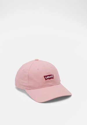 Pink baseball cap with red Levi's logo patch on front, displayed against a plain white background.