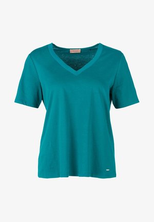 T-shirt en coton bleu sarcelle avec col en V, manches courtes et coupe décontractée. Présente un logo discret près de l'ourlet. Texture lisse.