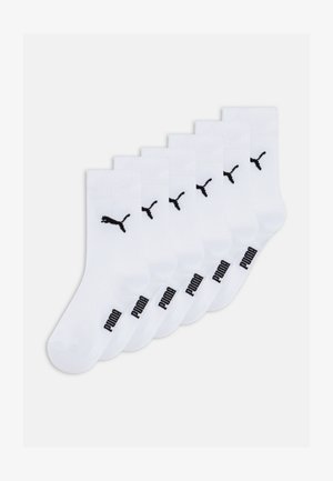 Valged puuvillased pahklu socksid kuuekomplektis, millel on must Puma logo ja tekst pahklu kohal. Sile tekstuur ja ribaga ääred.