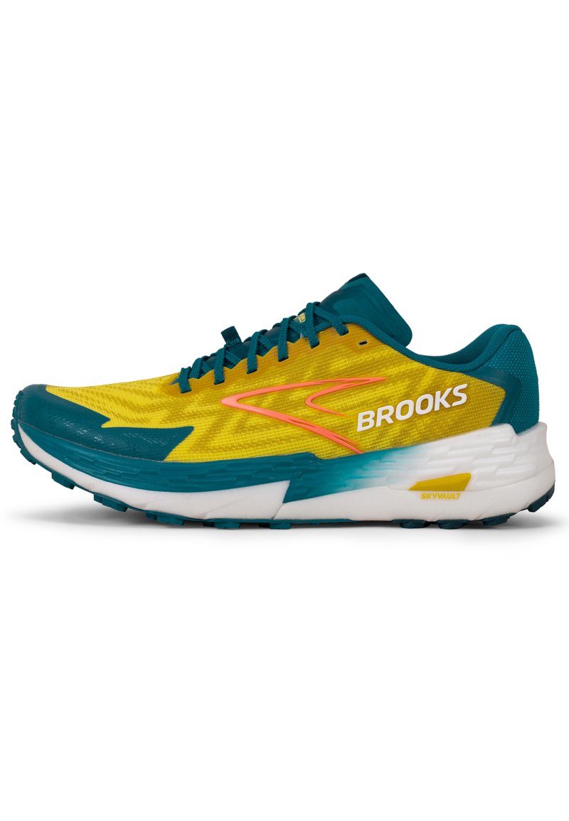 Brooks hardloopschoen met een gele mesh bovenkant, turquoise accenten, een roze logo en een witte tussenzool met een textuur voor grip op de buitenzool.
