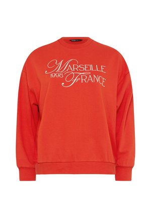 Lyse orange sweatshirt med hvidt kursivskrift "Marseille 1998 France" på fronten, med lange ærmer og ribstrikkede manchetter og kant.