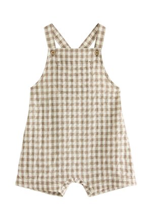 Beżowo-biała, w kratę, niemowlęca piżamka z przednią kieszenią, zapinanymi na guziki ramiączkami i krótkimi nogawkami.