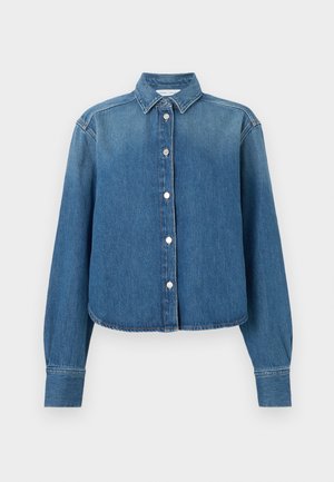 Blue denim shirt with a collared neck, long sleeves, and a button-front closure. Features a cropped hem and subtle texture.