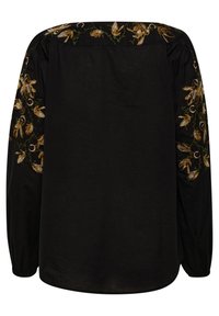 Blouse noire à manches longues avec une broderie florale complexe en or et vert sur les épaules, en tissu doux et avec une coupe décontractée.