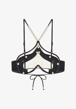 Černá a bílá braletka s průhledným síťovým materiálem, perlami jako ozdobou a hladkými ramínky. Nastavitelné šňůrky na zadní straně, s dekorační perlou.