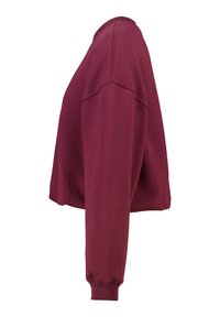 Bordeaux langwerpig sweatshirt met korte mouwen, voorzien van geribbelde manchetten en zichtbare naaddetails op de schouder en de mouw.