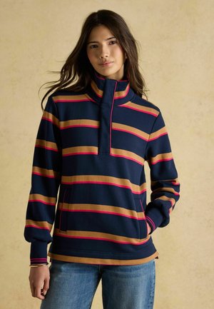 Fleece-Pullover mit hohem Kragen, mit horizontalen Streifen in Marineblau, Gold und Pink sowie seitlichen Taschen. Weicher Stoff und lockerer Schnitt.