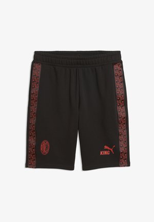 Shorts de sport noirs avec des bandes latérales rouges à motif, logo AC Milan sur la jambe gauche, et logo Puma rouge avec le texte « KING » sur la jambe droite.