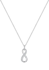 Collar de plata con un colgante en forma de infinito adornado con pequeñas piedras preciosas transparentes, suspendido de una fina cadena de metal.