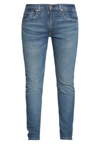 Blaue Slim-Fit-Denim-Jeans mit vorderem Knopf- und Reißverschluss, Fünf-Taschen-Design und dezentem Verblassen an Oberschenkeln und Knien.