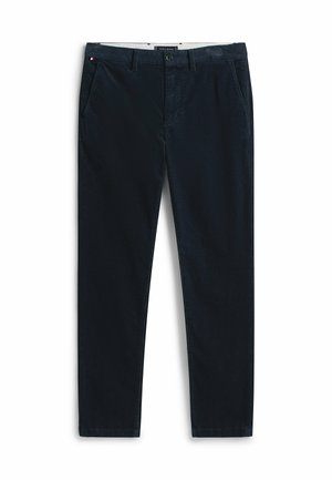 Marineblauwe katoen broek heeft een recht model, zijzakken en een knoopsluiting. De stof heeft een subtiele textuur en glans.