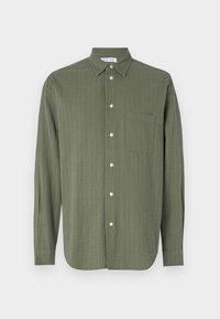 Atlasīts, four leaf clover