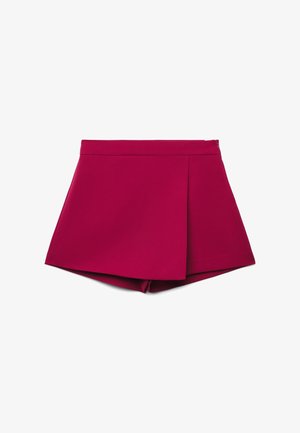 Short en skort taille haute magenta avec un panneau avant asymétrique et une fermeture éclair dissimulée sur le côté, présenté à plat sur un fond blanc.