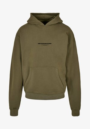 Olive green hoodie made of soft fabric, featuring a kangaroo pocket and ribbed cuffs. "METAMORPHOSIS" printed in black on the front.
