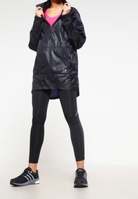 Under Armour Regnjacka - black