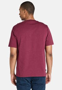 Timberland SHORT SLEEVE - T-shirt med print - burgundy