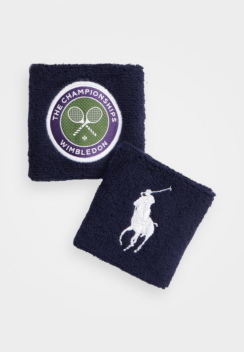 Jūras spēku kokvilnas rokassprādzes ar izšūtām logo: viena ar tenisa raketēm un "Čempionāti Vimbldonā", otra ar polo spēlētāju.
