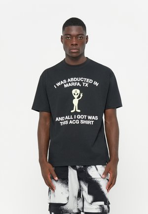 TEE ALIEN - Printtipaita - black