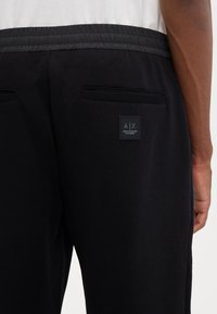 Armani Exchange TROUSERS TAILORING - Kelnės - black