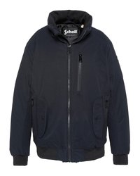 Marineblauwe bomberjack van stevig materiaal, met een hoge kraag, een rits aan de voorkant en twee zijzakken met kleppen.