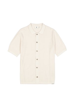 Lichtbeige polo met korte mouwen in geribbelde textuur, voorzien van een knoopsluiting aan de voorkant en een klassieke kraag. Heeft vijf knopen en een merklabel bij de zoom.