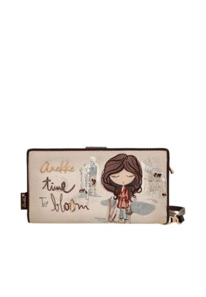 Borsa a tracolla beige con bambina dei cartoni animati, sfondo con schizzo della città e testo ricamato "Anekke time to bloom" sulla patta frontale.
