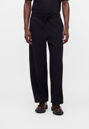 Rains, PANTS UNISEX - Παντελόνι φόρμας - black