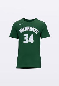 Zelena dres s kratkim rukavima od tkanine, s natpisom "MILWAUKEE" u bijeloj boji iznad broja "34" u bijelim mrežastim slovima. Nike logo na ramenu.
